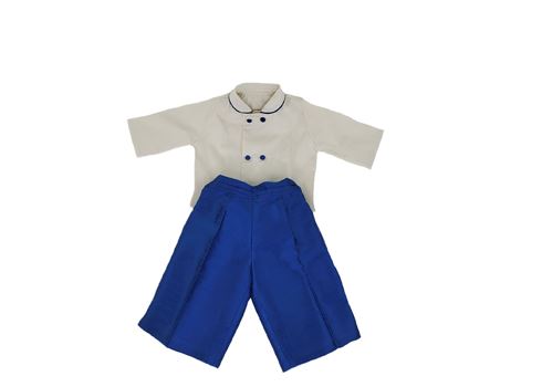 Ivory double-breasted cotton top with royal blue silk shorts, flat lay on white background