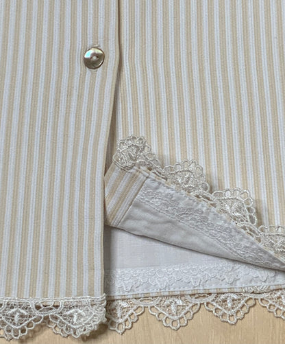 Close-up detail of The Sweet Vanilla lace trim, pearl button, and ivory striped fabric — Alfa Baby Boutique