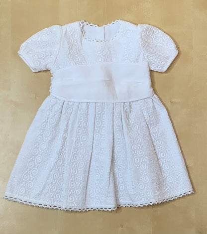 The Petite Lumière white embroidered cotton dress, back view with button closure — Alfa Baby Boutique