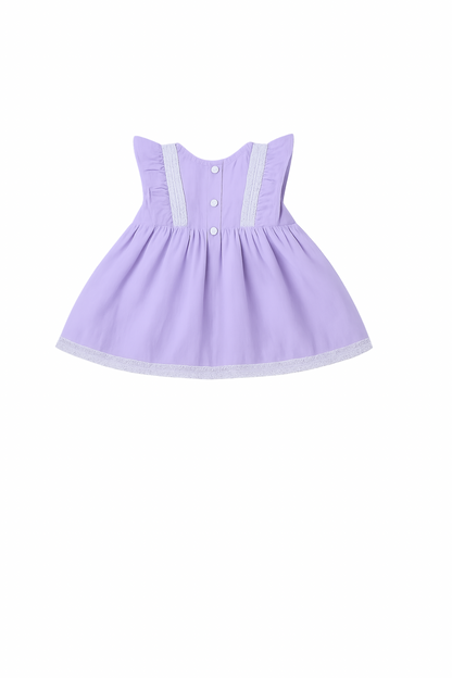 Lavender dress with white buttons on a white background