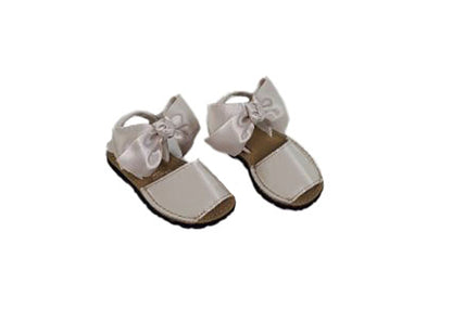 Sandy colored sandals with removable bow-girls